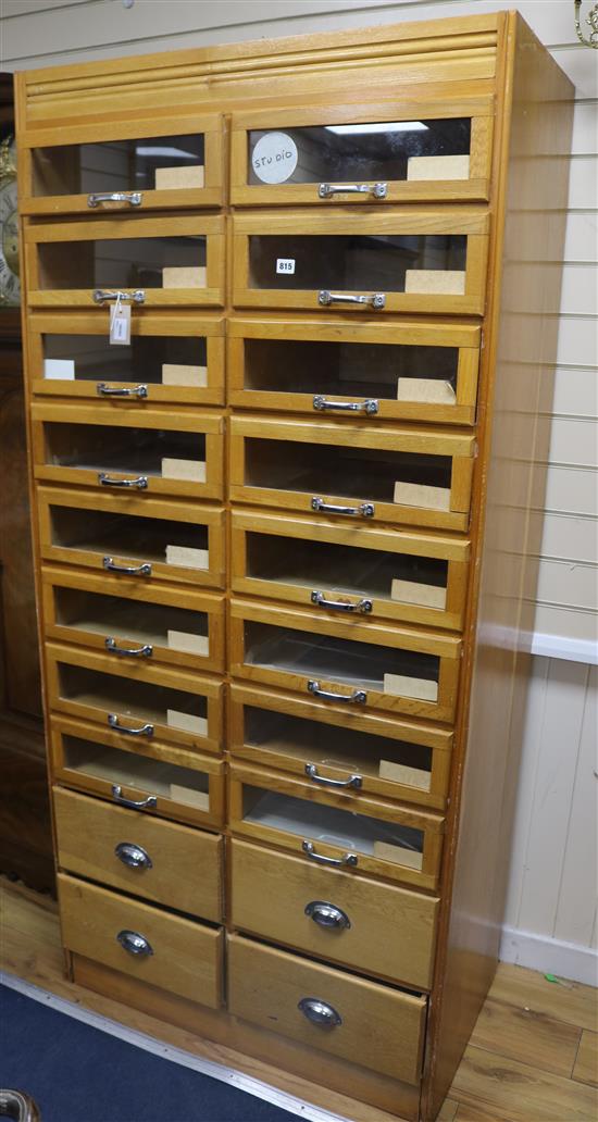 An oak multi-drawer haberdashery cabinet W.91cm